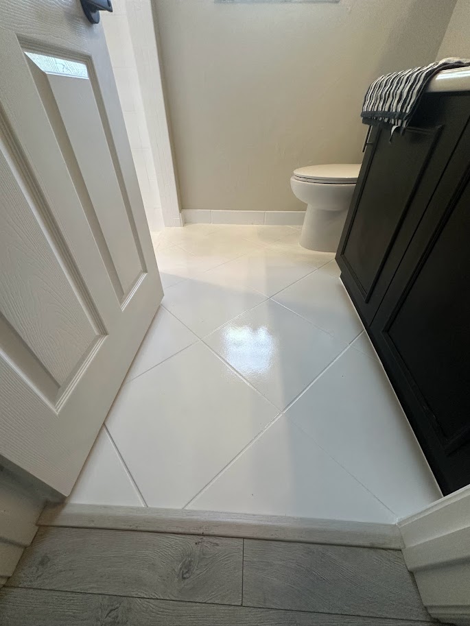 Resurfaced bathroom floor tiles 